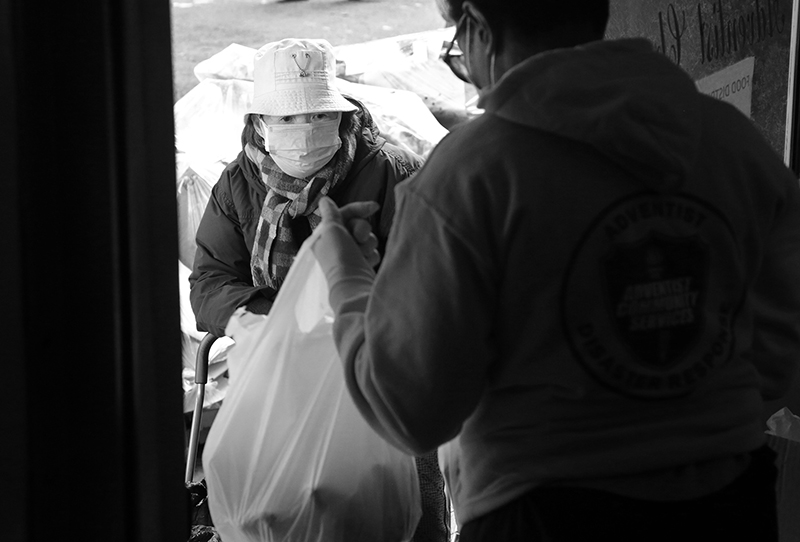 2020 : Food Lines : Seventh Day Adventists Help the Needy : Streetlife : New York City : Times Square : Richard Moore : Photographer : Photojournalist